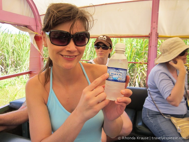 Drinking water on the bus.