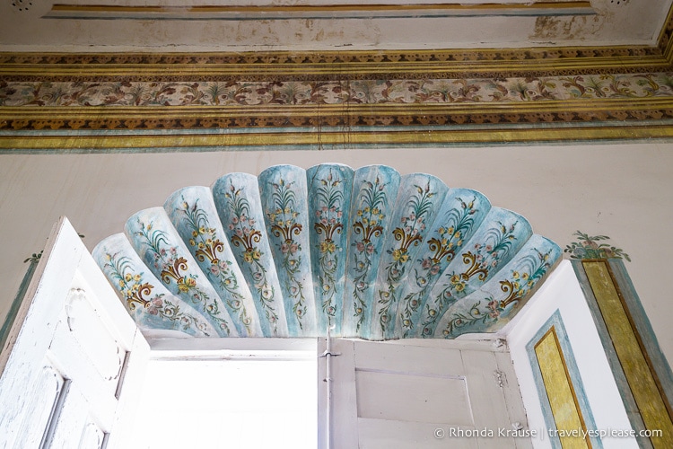 Fresco above a window in Palacio Cantero.