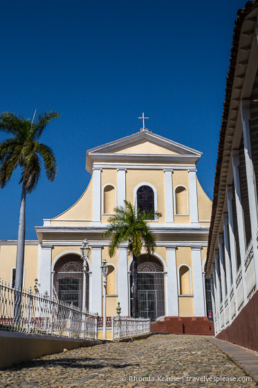 Cobblestone street leading to Iglesia Parroquial de la Santisima Trinidad.