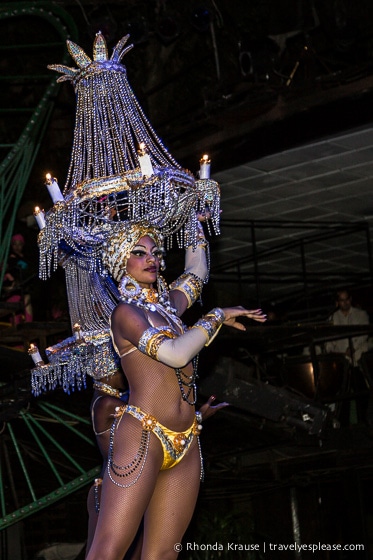 Dancer with a chandelier headdress.