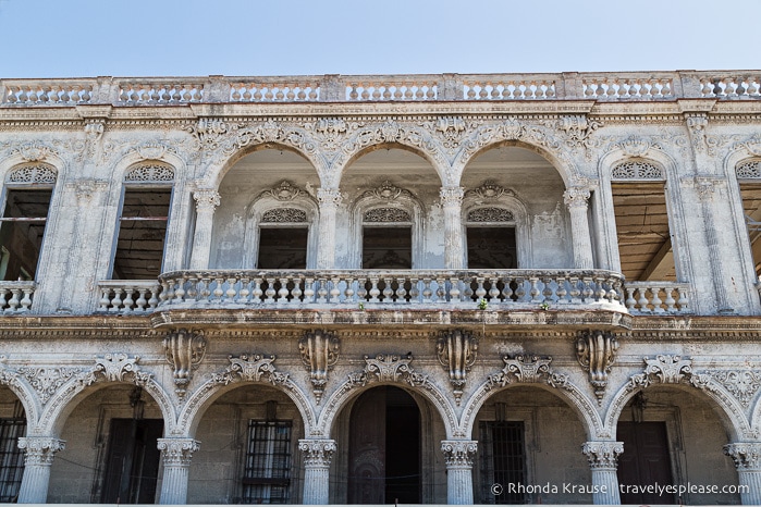 Decorative details and balcony on an old building.