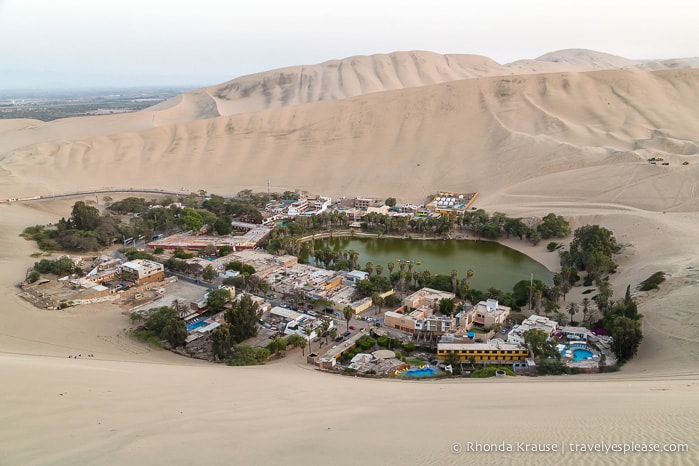 Learning How to Sandboard in Huacachina, Peru