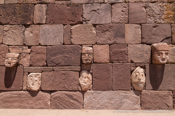 Carved stone heads in the Semi-Subterranean Temple at Tiwanaku, Bolivia.