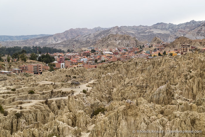 Moon Valley with houses and mountains in the background.