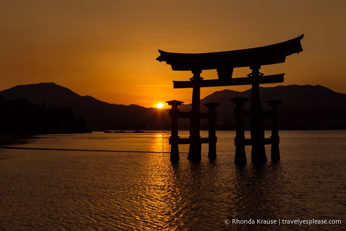 Japan bucket list- Watch the sunset in Miyajima (sun setting behind the Great Torii at Miyajima)