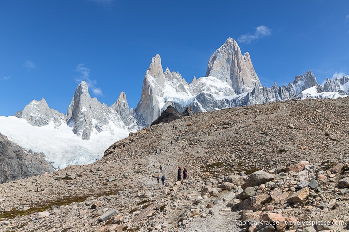 Trail crossing a rock field in front of Mount Fitz Roy.