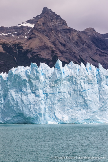 Perito Moreno Glacier with a mountain in the background.
