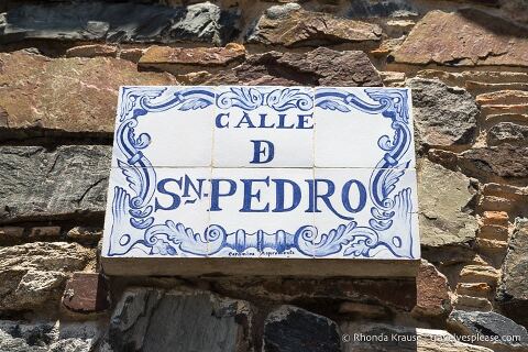 Blue and white tile street sign. 
