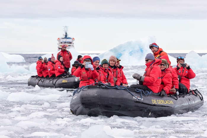 Zodiacs cruising in floating ice.