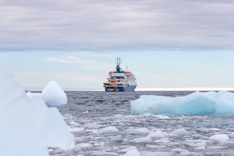 Antarctica cruise ship and floating ice.