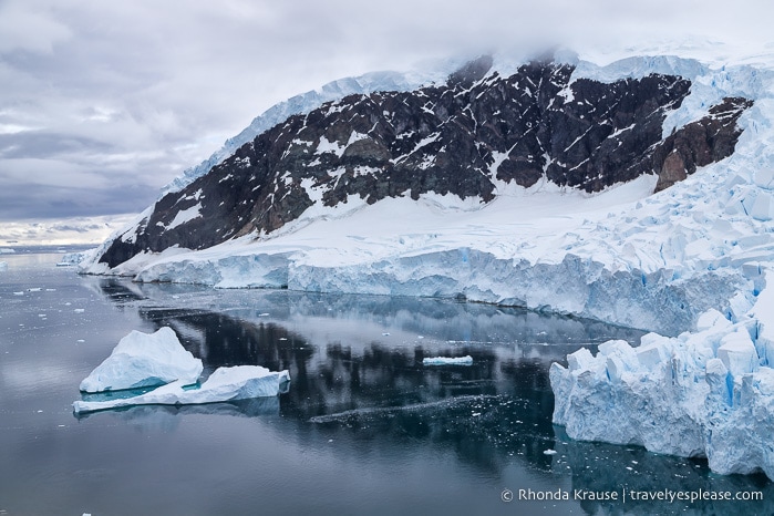 Glacier flowing down to a bay.