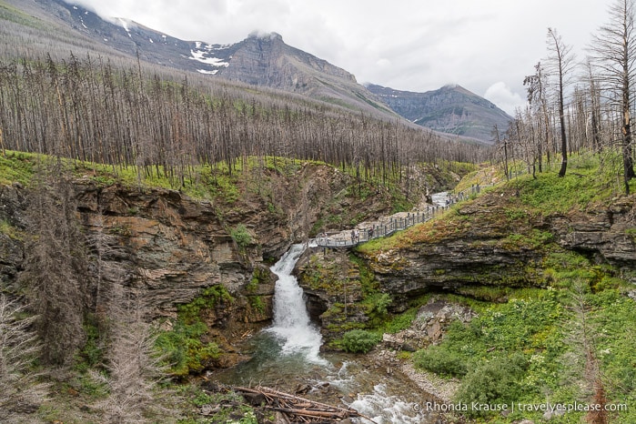 Blakiston Falls backed by mountains.