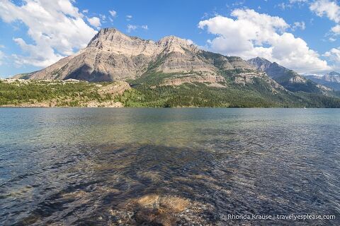 Mountains lining the shore of Upper Waterton Lake.