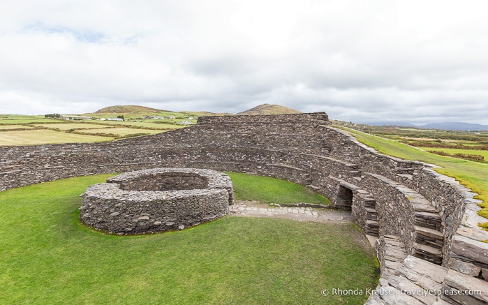 Cahergall Ringfort with hills and farmland in the background.