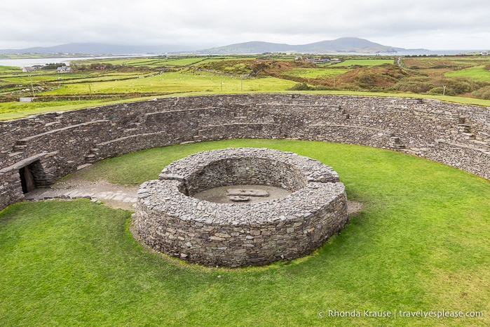 Partial walls of a circular stone hut inside Cahergall ringfort.