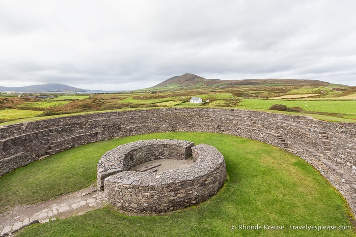 View of green fields and hills as seen from the top of Cahergall ringfort.