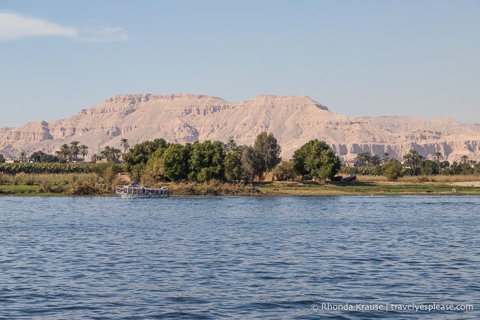 Nile River with a rocky hills in the background.