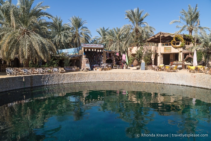 Cleopatra Spring with cafes in the background.