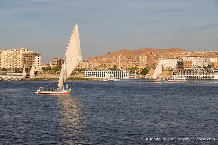 Felucca boat sailing on the Nile in Aswan.