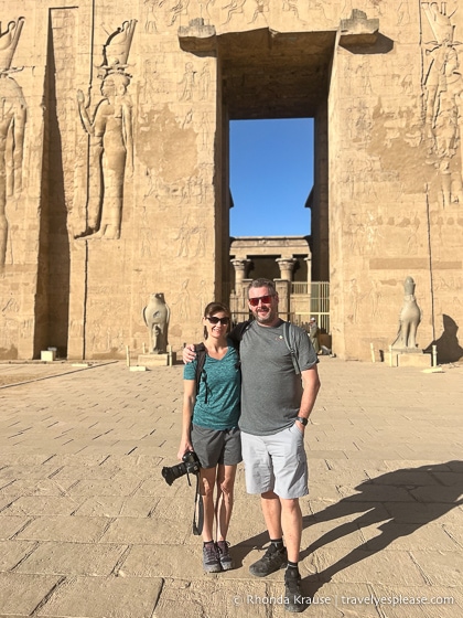Couple standing in front of Edfu Temple.