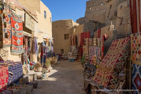 Rugs hanging at a market in Siwa.