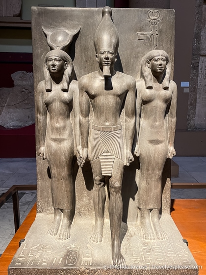 Triad statue with King Menkaure, Hathor, and a nome deity in the Egyptian Museum.