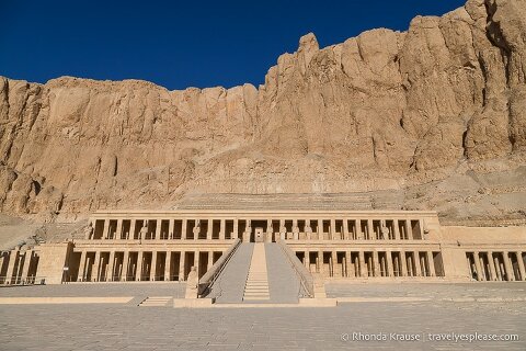 Hatshepsut Temple built in front of a rocky cliff.