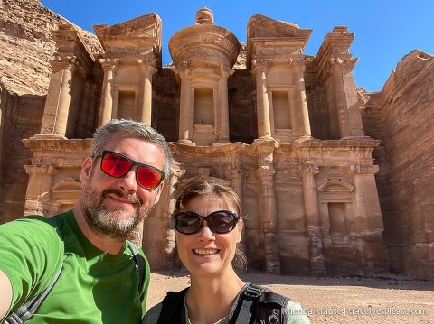 Us in front of the Monastery at Petra, one of our favourite places on our Jordan itinerary.
