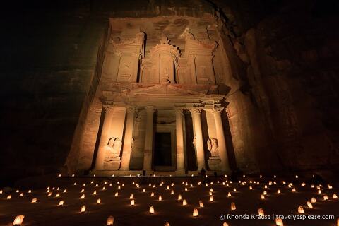 The Treasury illuminated in warm light during Petra By Night.