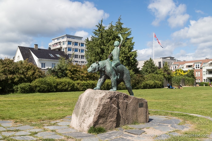 Statue of a boy riding a bear in Kristiansand. 