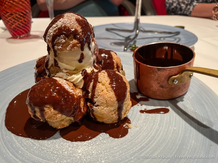 Chocolate drizzled profiteroles.