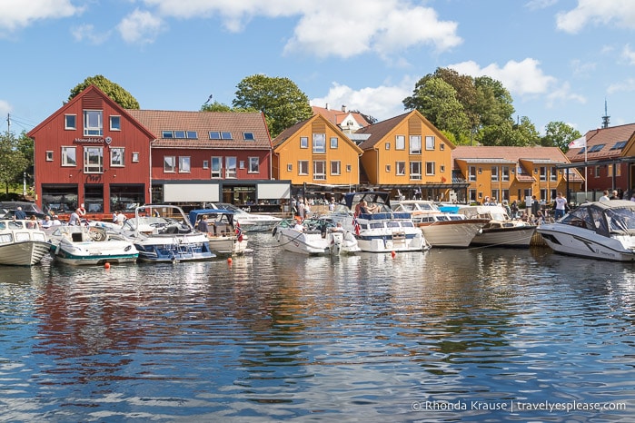 Colourful buildings and boats near the fish market in Kristiansand.
