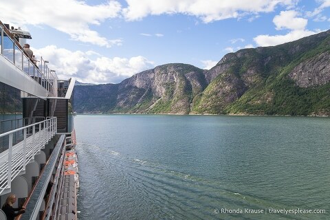 Cruise ship sailing down Hardangerfjord.
