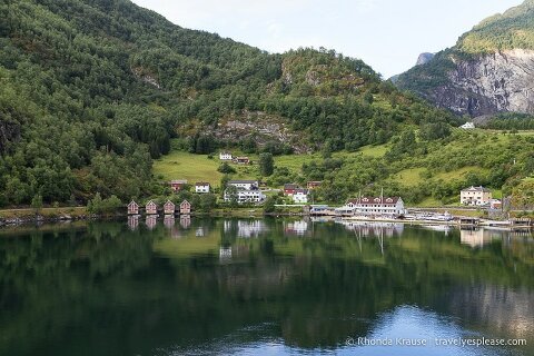 Mountain-framed harbour in Flam, a popular port of call on Norway fjord cruises.