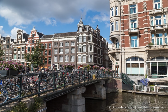 Bridge with bikes parked on it in Amsterdam.