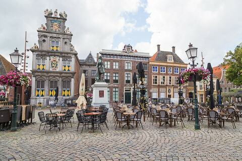 Table and chairs in the historic town square in Hoorn.