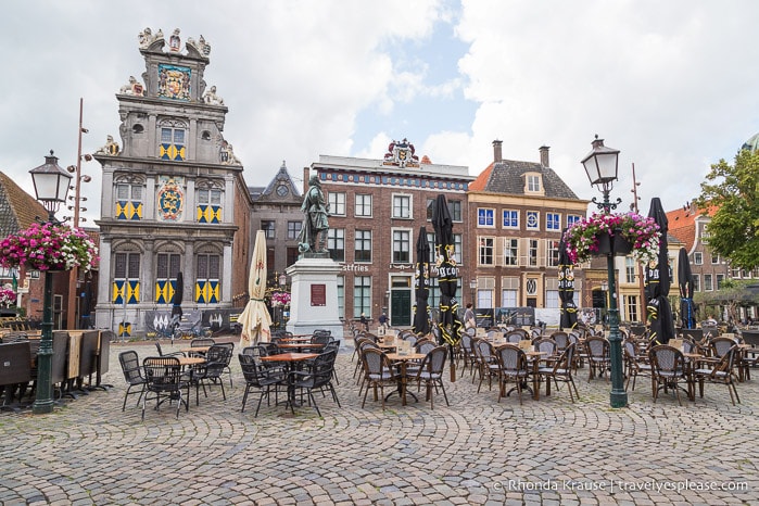 Table and chairs in the historic town square in Hoorn.