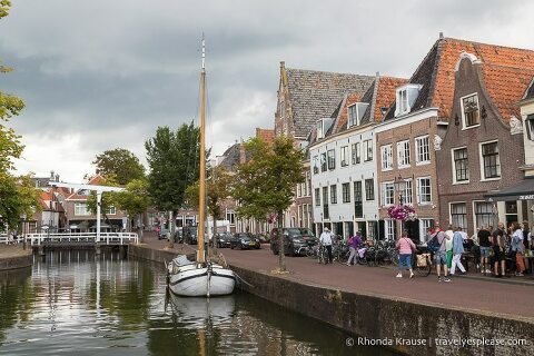 Boat and buildings along a canal in Hoorn.