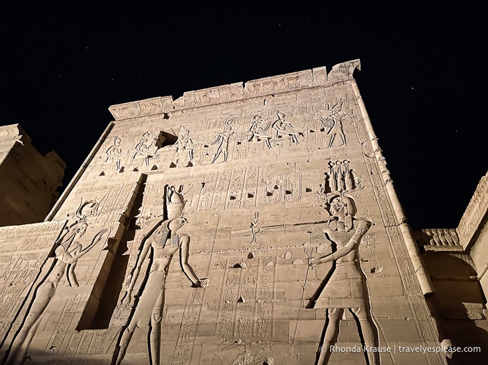Pylon with carvings lit up during the Philae Temple light show.