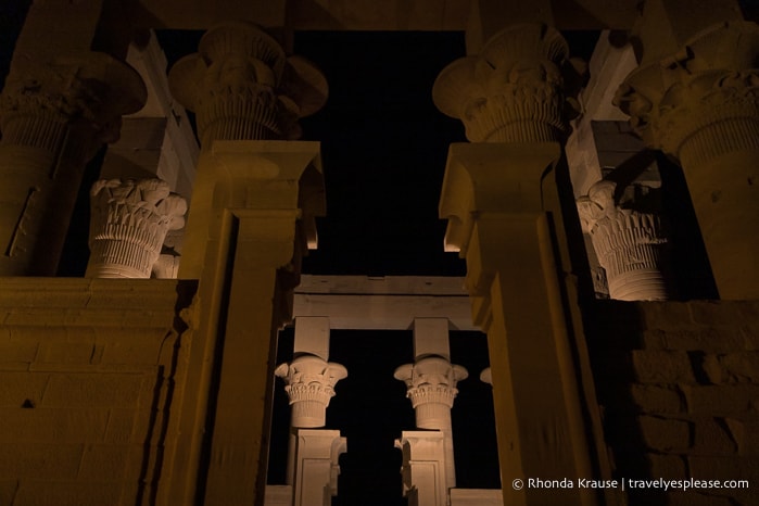 Columns of Trajan’s Kiosk lit up at night.