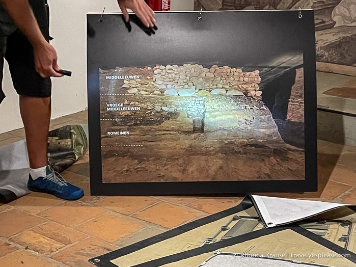 Picture of the layers of construction materials used on a wall through different eras.