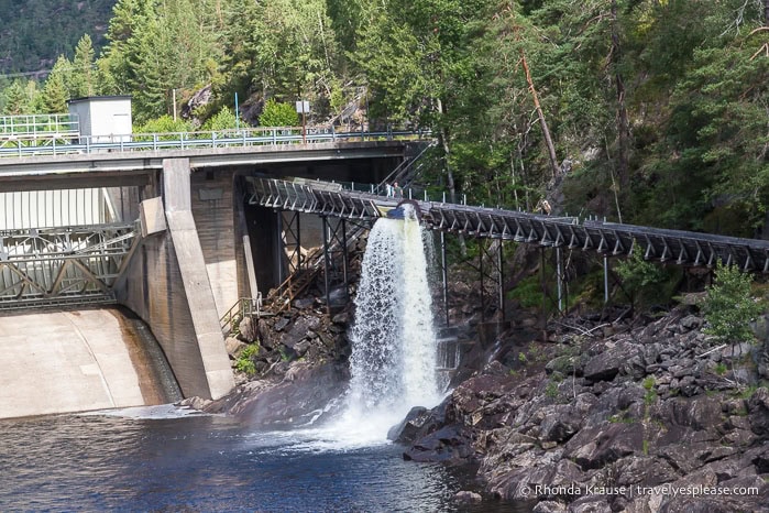 Dam, log chute, and waterfall.