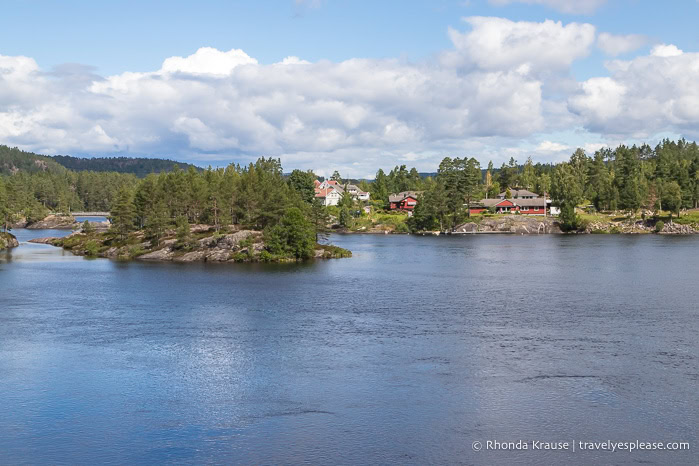 River and islands and some houses in the distance.