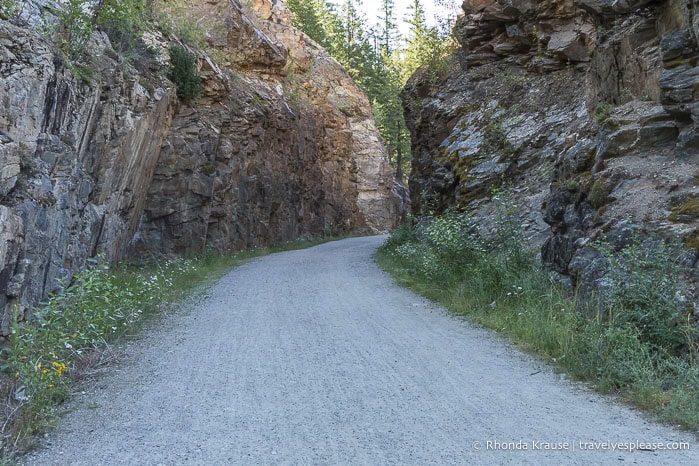 Myra Canyon Trail going between walls of rock.