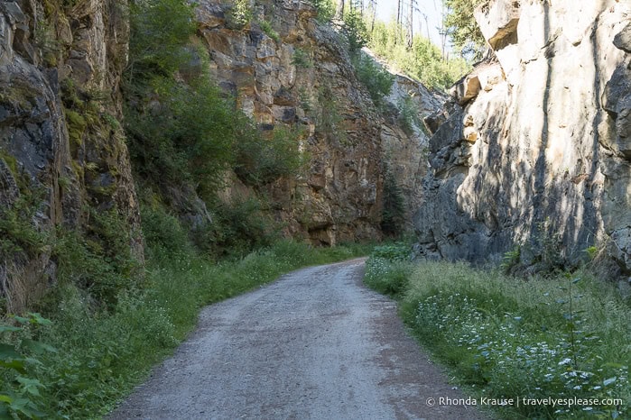 Trail between walls of rock.