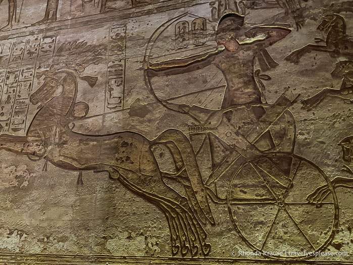 Relief of Ramesses II shooting an arrow from a chariot.