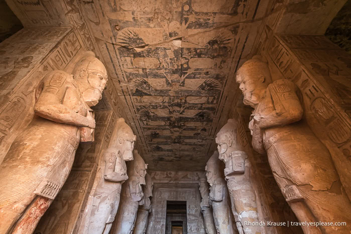 Statues of Ramesses II lining the hypostyle hall inside the Great Temple at Abu Simbel.