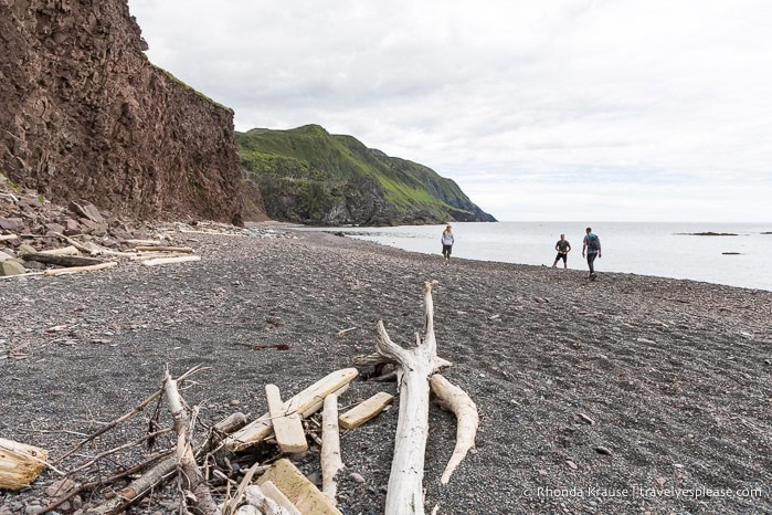 Beach beside cliffs. 