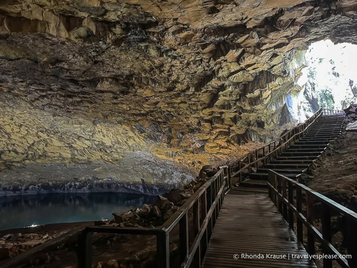 Staircase and lake inside the Furna do Enxofre cave.