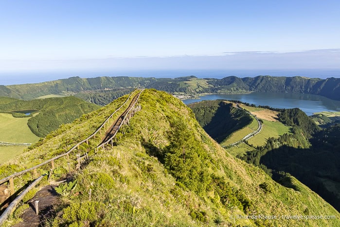 Path on a ridge leading toward crater lakes at the Grota do Inferno viewpoint. 